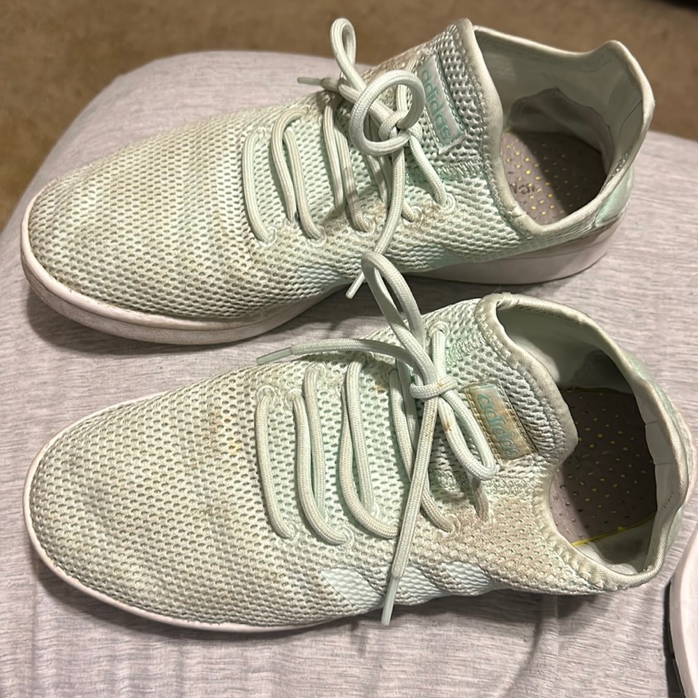 Adidas tennis shoes.